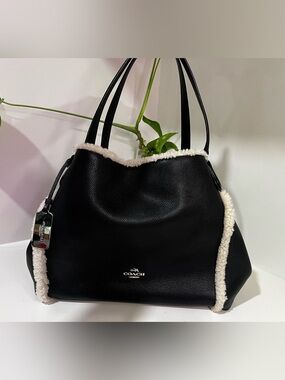 Coach Edie 31 Black Leather Shearling
Trim Shoulder Bag